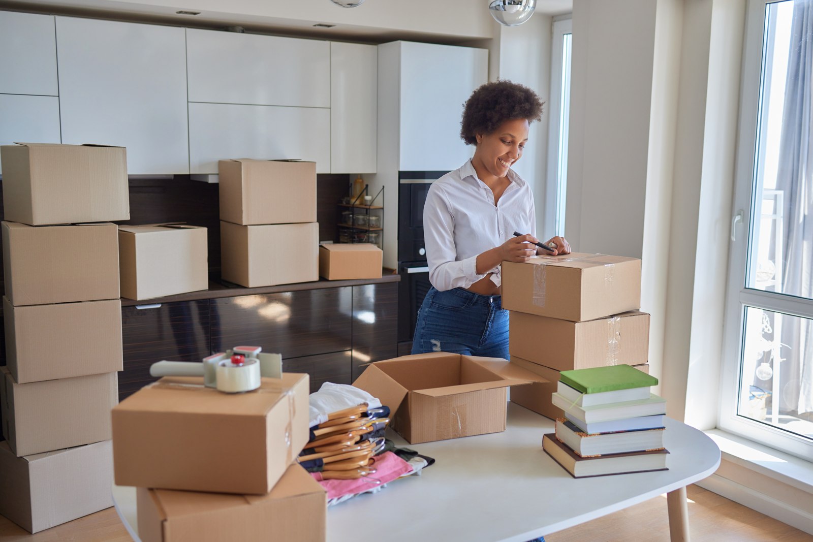 Home packed with cardboard boxes before moving day