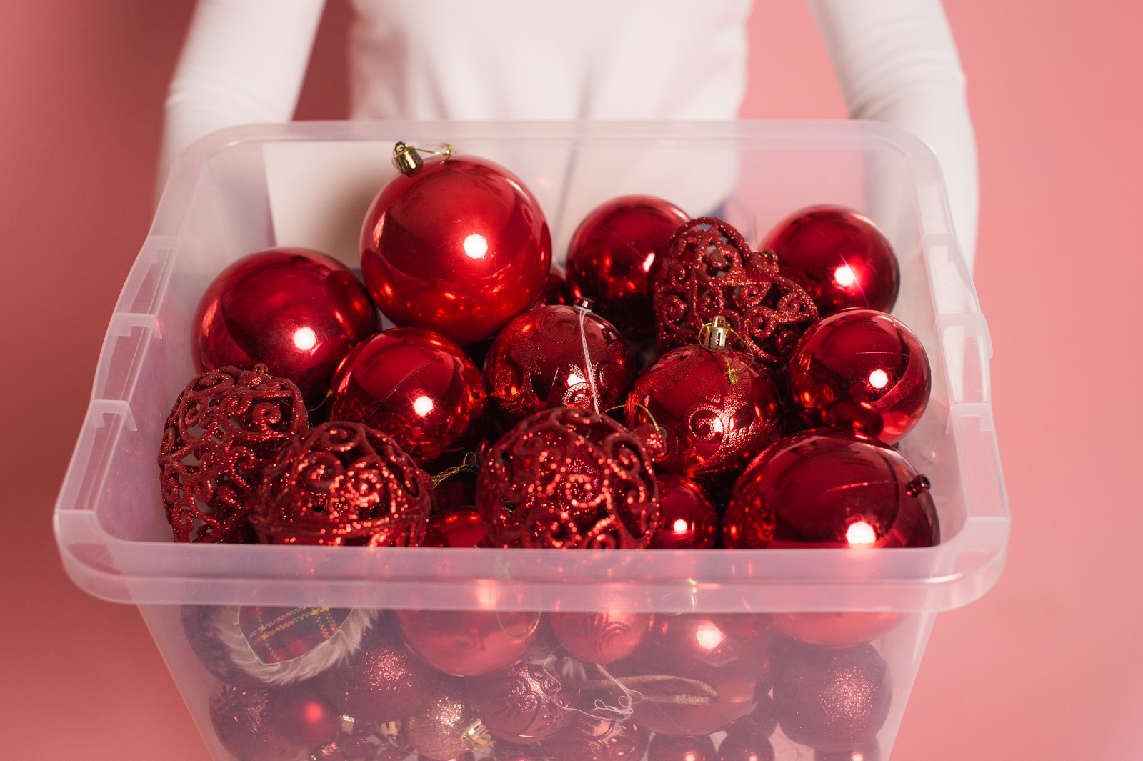 Seasonal decorations organized in a storage container