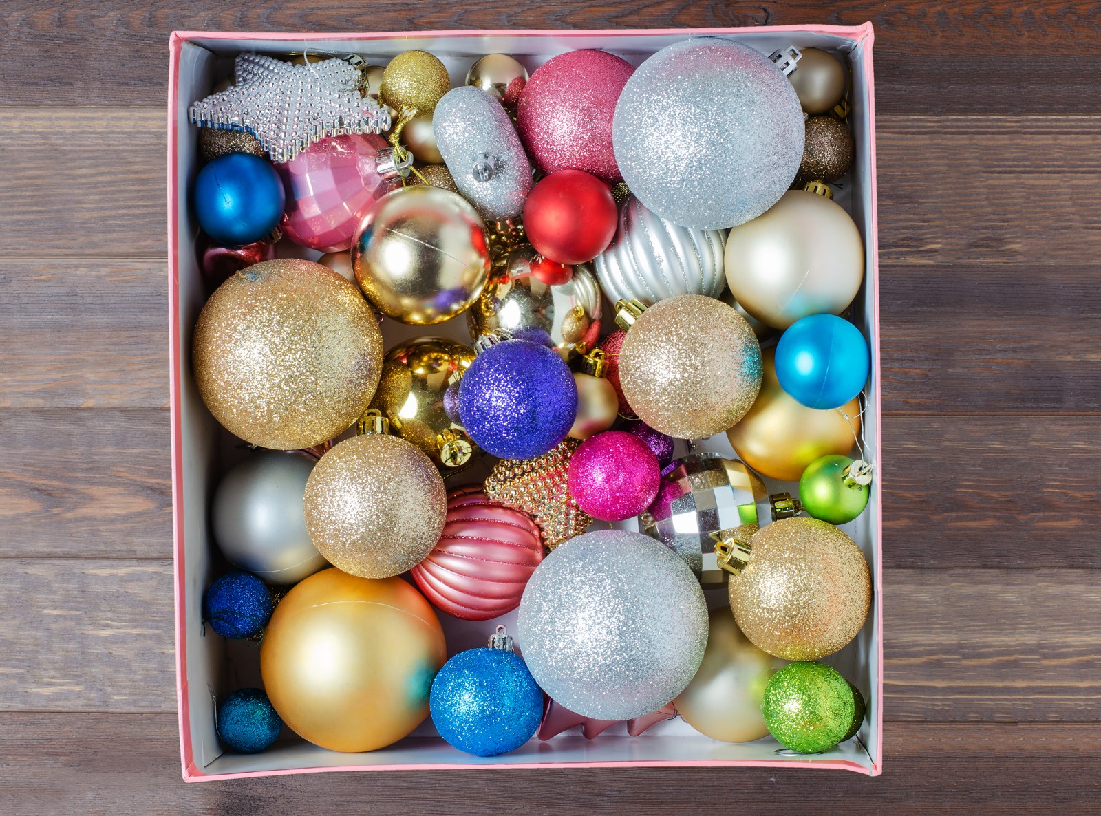 Holiday ornaments packed in a cardboard box